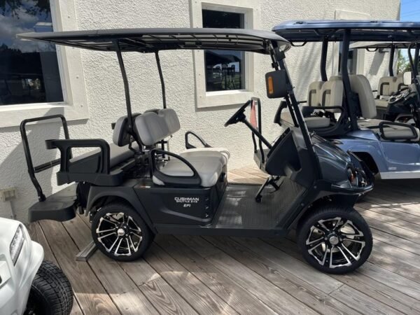 Rear seating and cargo area of 2024 Cushman Shuttle 2+2 Gas at Highland Park Golf Club.