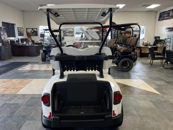 Wheels and suspension of 2024 E-Z-GO Freedom RXV ELiTE Lithium Bright White in Los Angeles California