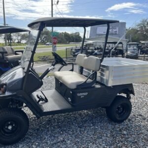 صورة جانبية لعربة المرافق Cushman Hauler 1200X Gas 2025 في نابولي، فلوريدا.