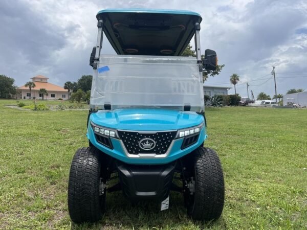 Side profile of 2025 Evolution D-Max GT4 Sky Blue four-passenger electric golf cart, nationwide delivery and export available