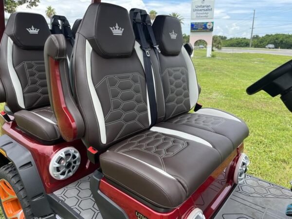 Dashboard and touchscreen interior of 2025 Evolution D-Max XT4 in red available in Texas