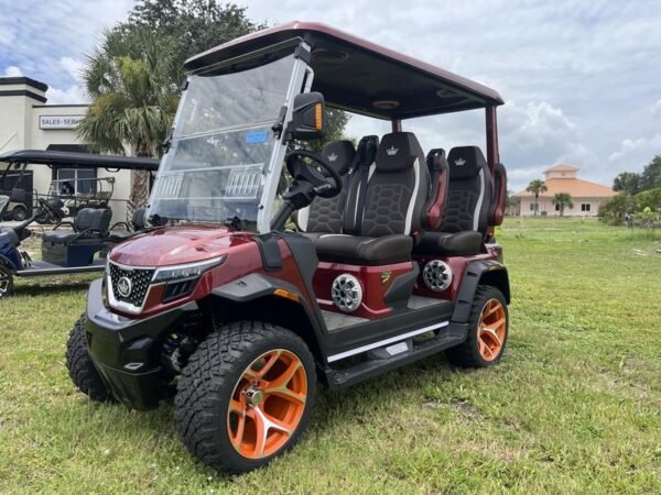 Front view of red 2025 Evolution D-Max XT4 electric golf cart available in Texas with nationwide delivery and export options