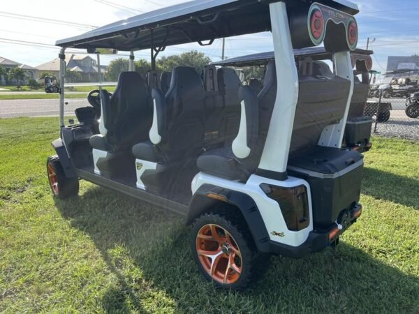 Rear cargo space of 2025 Evolution D-Max XT6 white electric golf cart available in Michigan