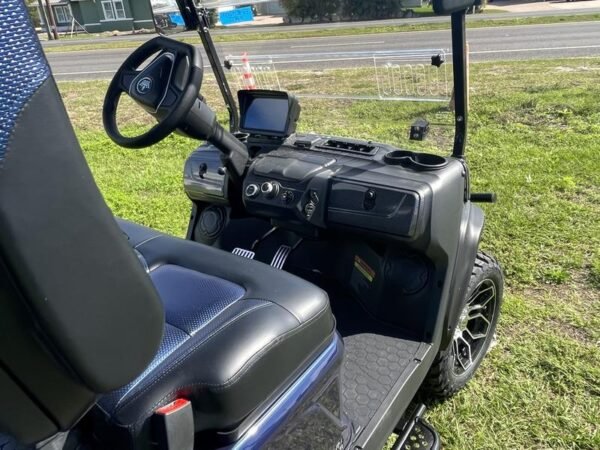 Dashboard interior of 2025 Evolution D5-Maverick 4 blue electric golf cart