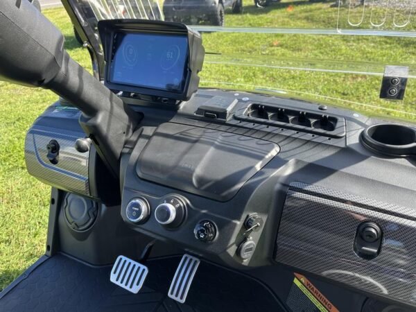 Dashboard interior of 2025 Evolution D5-Maverick 4 Plus black electric golf cart