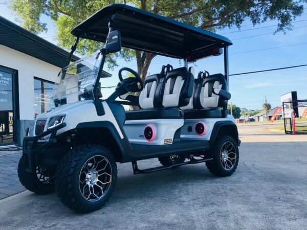 Front angle of 2025 Evolution D5-Maverick 4 Plus white electric golf cart