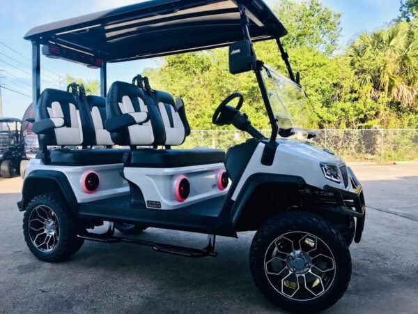 Street-legal 2025 Evolution D5-Maverick 4 Plus white golf cart on road