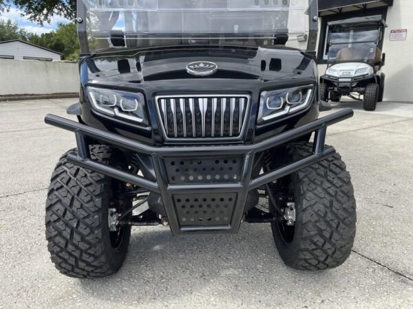 Front angle of 2025 Evolution D5 Maverick 4+2 Plus electric golf cart
