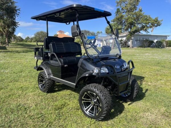 Front view of 2025 Evolution Forester 4 Plus black electric golf cart available in Tennessee with nationwide delivery and export options