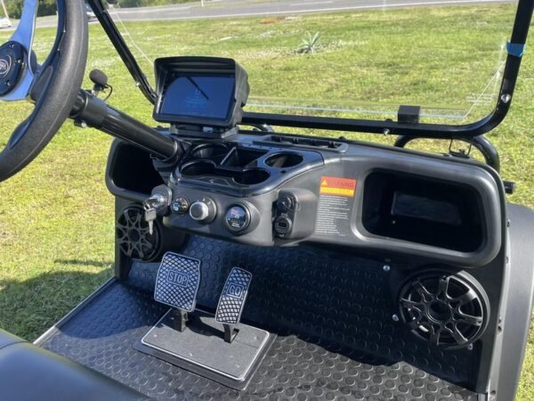 Interior seating of 2025 Evolution Forester 4 Plus black four-passenger golf cart available in Tennessee
