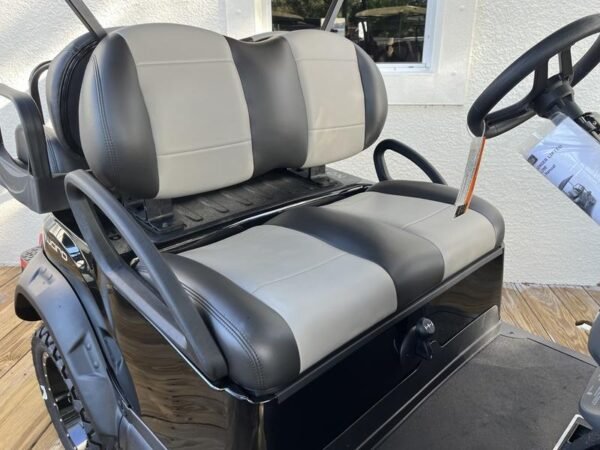 Lifted suspension and all-terrain tires on 2025 Club Car Onward Lifted 4 Passenger Gas in Dallas Texas