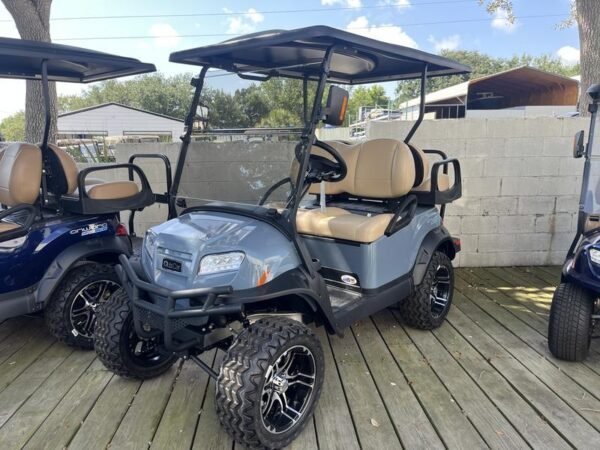 Side view of 2025 Club Car Onward Lifted 4 Passenger XR Lithium golf cart in Nashville Tennessee