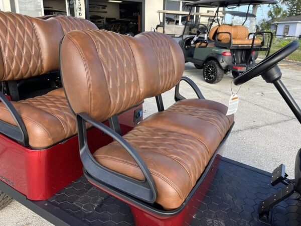 Interior seating of 2025 E-Z-GO Express 6 ELiTE Lithium Inferno Red in Los Angeles California