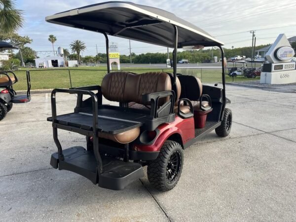 Wheels and suspension of 2025 E-Z-GO Express 6 ELiTE Lithium Inferno Red in Los Angeles California
