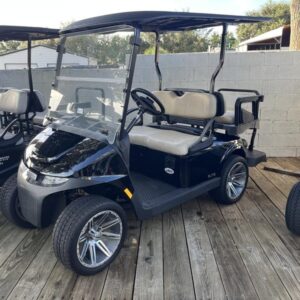 Side view of 2025 E-Z-GO Freedom RXV ELiTE Lithium Black in Charlotte North Carolina