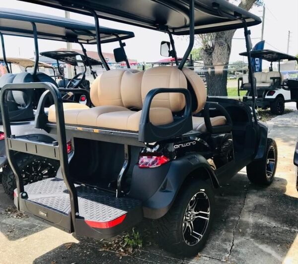 Front view of black 2026 Club Car Onward Lifted 4 Passenger Gas with LED headlights available in Texas and nationwide