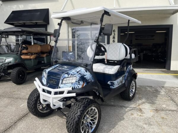 Side view of 2026 Club Car Onward Lifted 4 Passenger Gas golf cart in Georgia