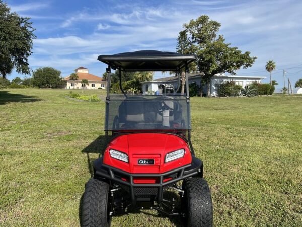 Lifted suspension and off-road tires on 2026 Club Car Onward Lifted 4 Passenger Gas red California