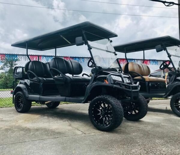 Side view of 2026 Club Car Onward Lifted 6 Passenger Gas black golf cart in Ohio