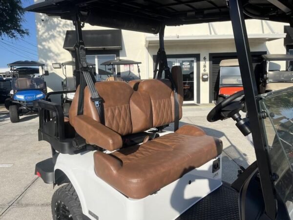 Side view of 2026 E-Z-GO Freedom RXV ELiTE Lithium Bright White in Columbus Ohio