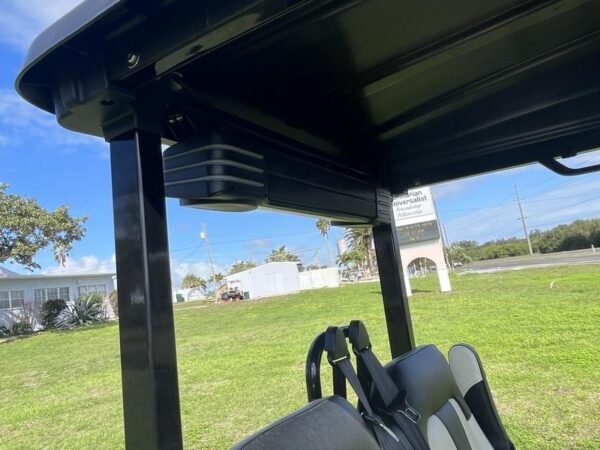 Street-legal 2025 Evolution D5-Maverick 4 blue golf cart on road