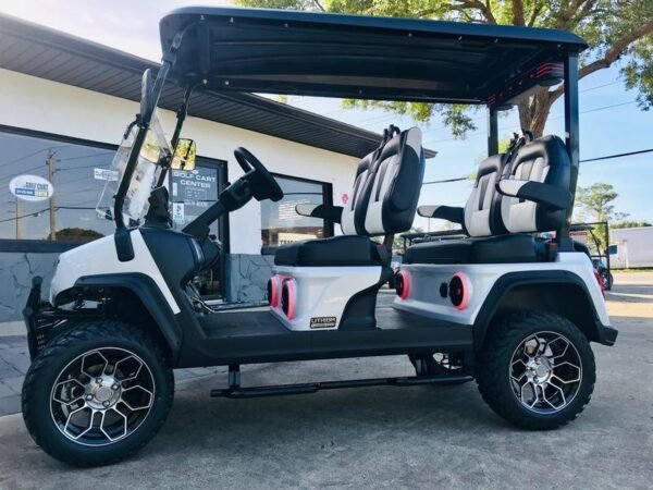 Street-legal 2025 Evolution D5-Maverick 4 Plus white golf cart on road