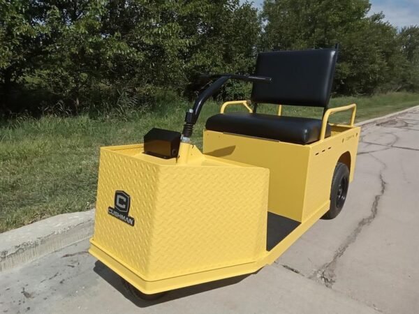 Autocarro elettrico Cushman Minute Miser 24V del 2026, colore giallo, ideale per il trasporto di carichi.