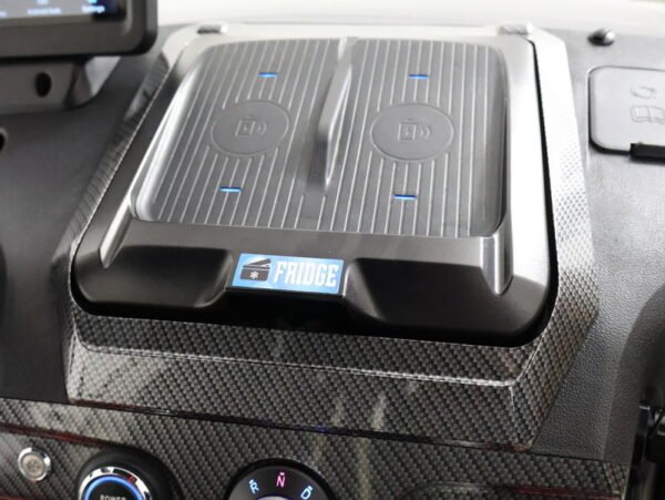 Wireless phone charging pad on the Evolution D-MAX XT4 dash