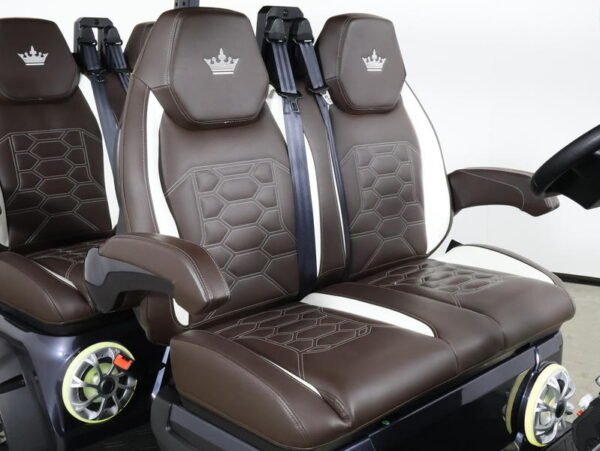 Brown and white luxury seats in the Evolution D-MAX XT4