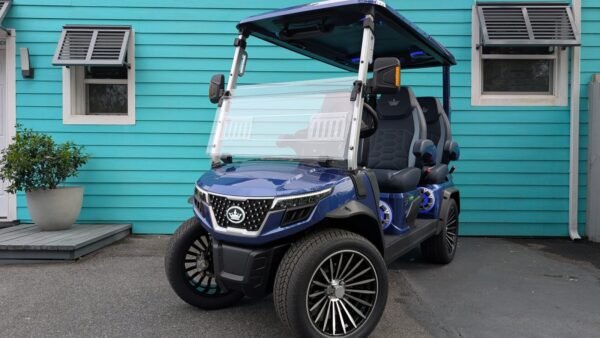 2026 Evolution D-Max GT4 golf cart in blue, front three-quarter view