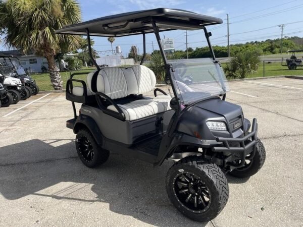 2027 Club Car Onward Lifted 4 Passenger Gas in black, front three-quarter view