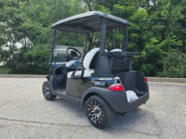 2027 Club Car Onward 2 Passenger in metallic black, rear three-quarter view
