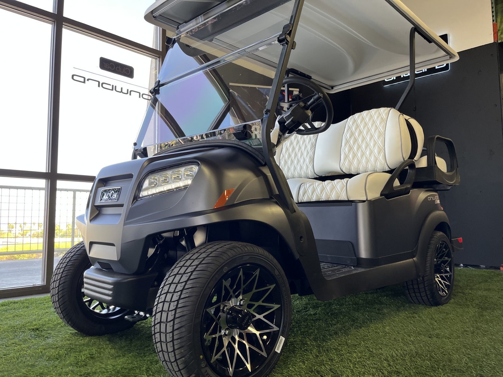 2027 Club Car Onward 4 Passenger in matte graphite, front three-quarter view