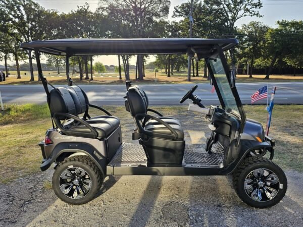 Side view of the black Club Car Onward 4 Forward showing four forward-facing seats