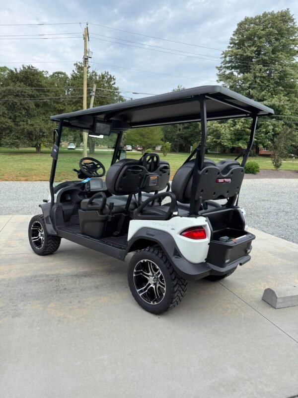 Side view of the Club Car Onward 4 Forward showing four forward-facing seats