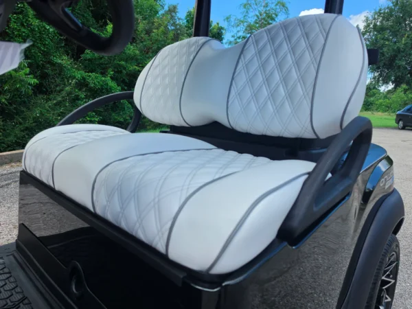 White diamond-stitched seats in the Club Car Onward 2 Passenger